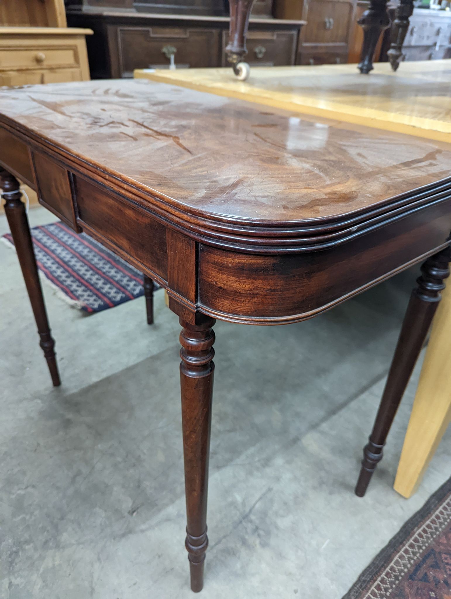 A Regency mahogany rectangular folding tea table, width 90cm, depth 45cm, height 74cm